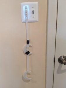 Two light switch extenders connected 