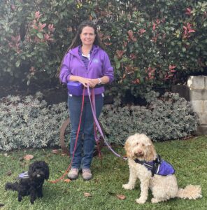 Amanda Hayward and two service dogs in training